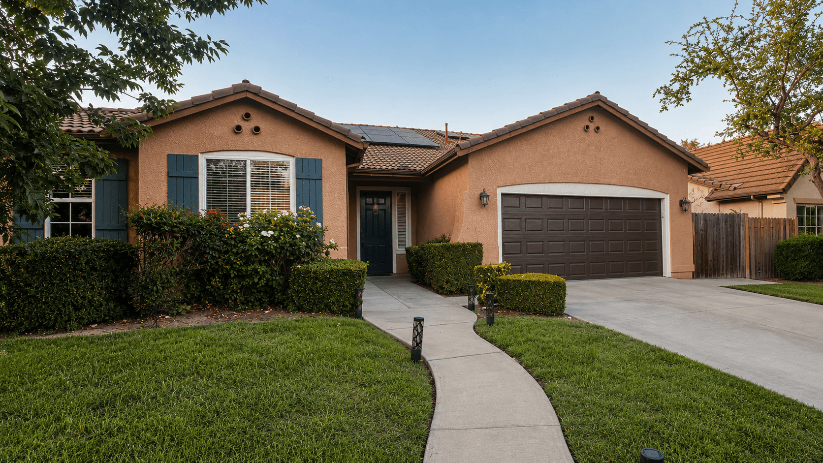 Exterior of the Joy in Caring II home on Buckingham Avenue in Clovis, with a landscaped front yard