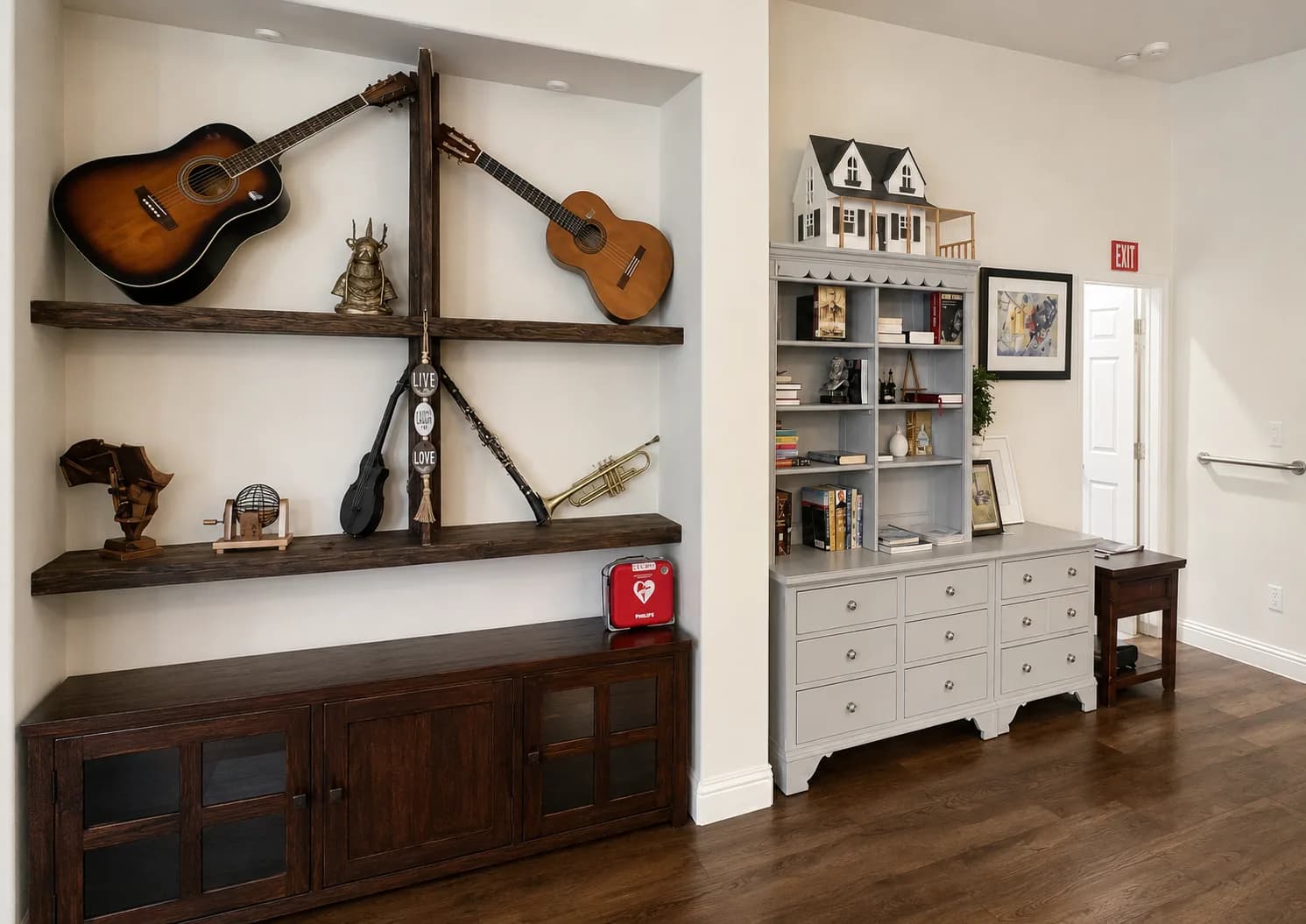 Display shelving with musical instruments and keepsakes at Joy in Caring II
