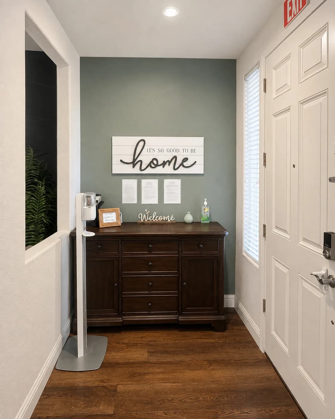 Welcoming entryway at Joy in Caring II with an "it's so good to be home" sign